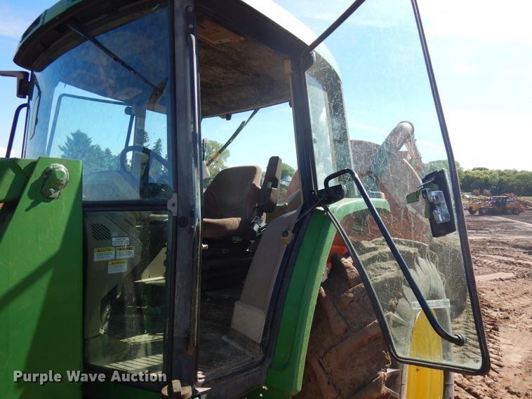 image for item IL9824 1998 John Deere 6410  MFWD tractor