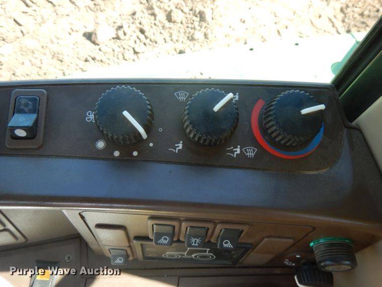 image for item IL9824 1998 John Deere 6410  MFWD tractor