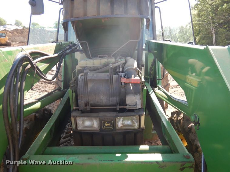 image for item IL9824 1998 John Deere 6410  MFWD tractor