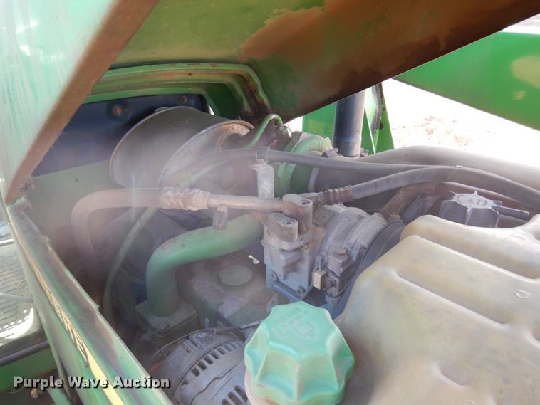 image for item IL9824 1998 John Deere 6410  MFWD tractor