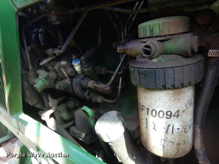 image for item IL9824 1998 John Deere 6410  MFWD tractor