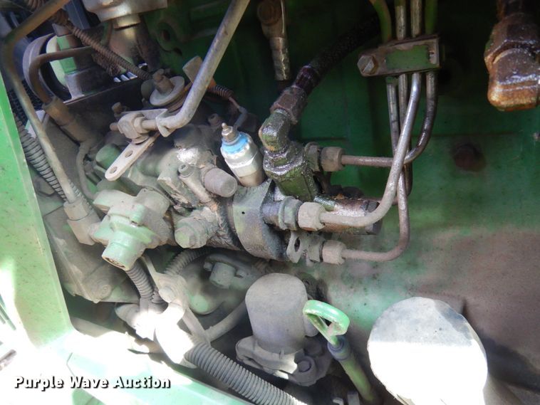 image for item IL9824 1998 John Deere 6410  MFWD tractor