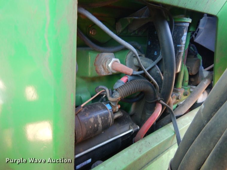 image for item IL9824 1998 John Deere 6410  MFWD tractor