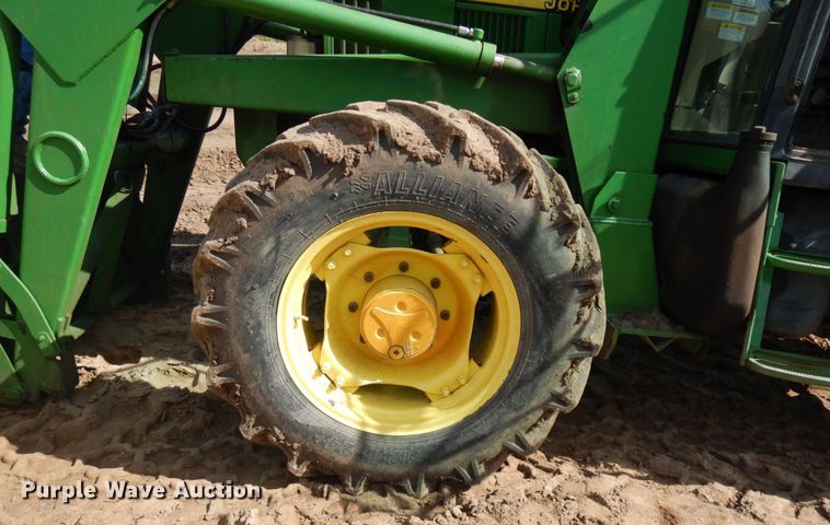 image for item IL9824 1998 John Deere 6410  MFWD tractor