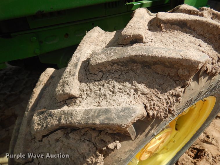 image for item IL9824 1998 John Deere 6410  MFWD tractor