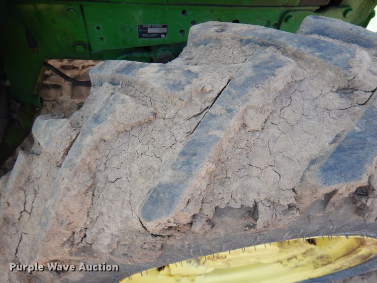 image for item IL9824 1998 John Deere 6410  MFWD tractor