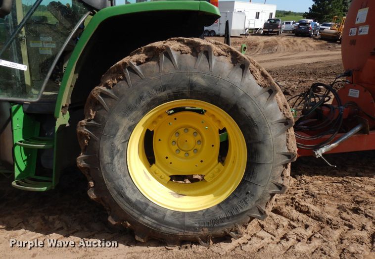 image for item IL9824 1998 John Deere 6410  MFWD tractor