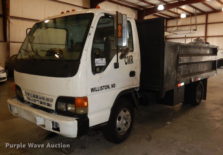 image for item DI6721 1999 Isuzu NPR  flatbed truck