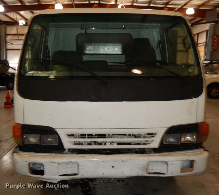 image for item DI6721 1999 Isuzu NPR  flatbed truck