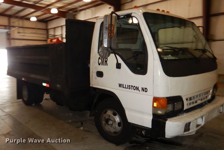 image for item DI6721 1999 Isuzu NPR  flatbed truck