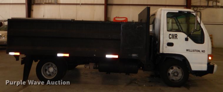 image for item DI6721 1999 Isuzu NPR  flatbed truck