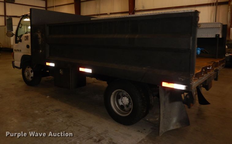 image for item DI6721 1999 Isuzu NPR  flatbed truck