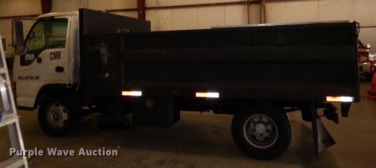 image for item DI6721 1999 Isuzu NPR  flatbed truck