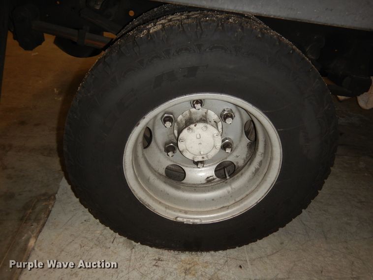 image for item DI6721 1999 Isuzu NPR  flatbed truck