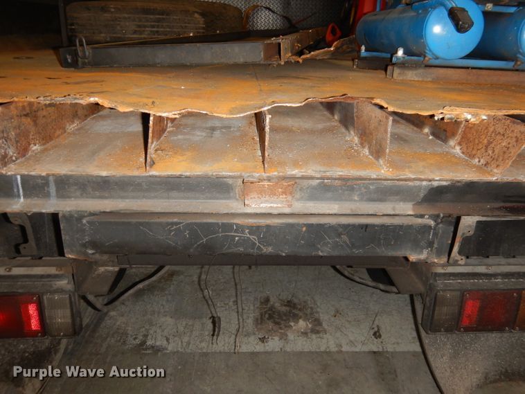 image for item DI6721 1999 Isuzu NPR  flatbed truck