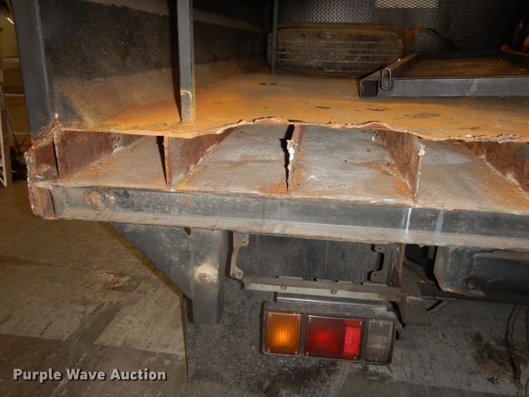 image for item DI6721 1999 Isuzu NPR  flatbed truck