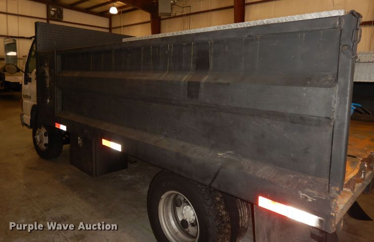 image for item DI6721 1999 Isuzu NPR  flatbed truck