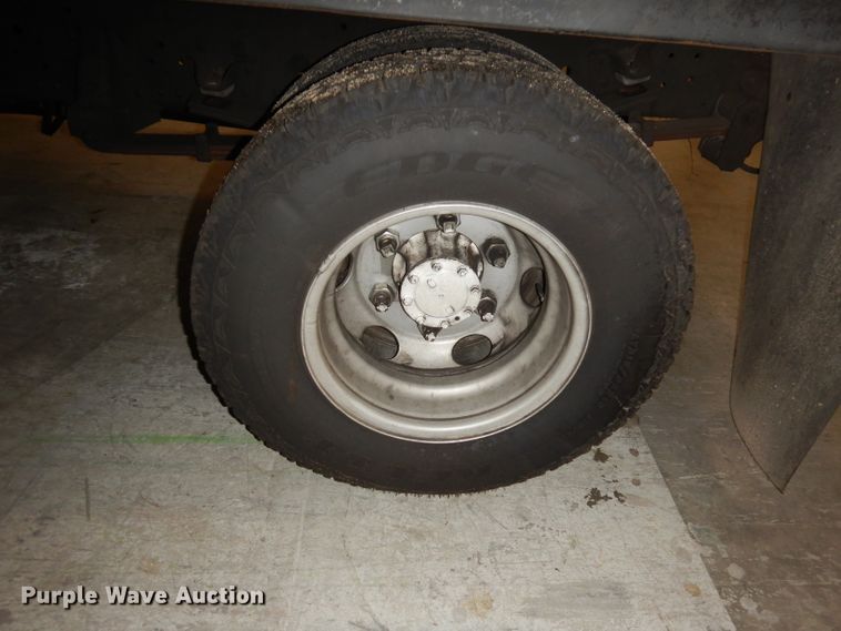 image for item DI6721 1999 Isuzu NPR  flatbed truck