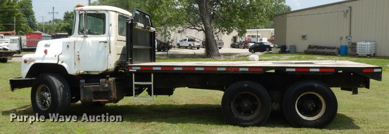 image for item HP9579 1984 Mack DM492S  flatbed truck