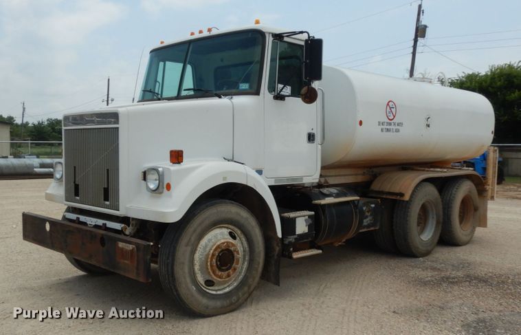 image for item DC2052 1990 White GMC WCS  water truck