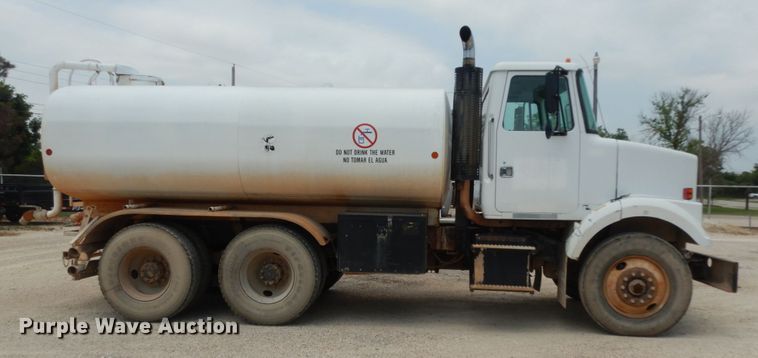 image for item DC2052 1990 White GMC WCS  water truck
