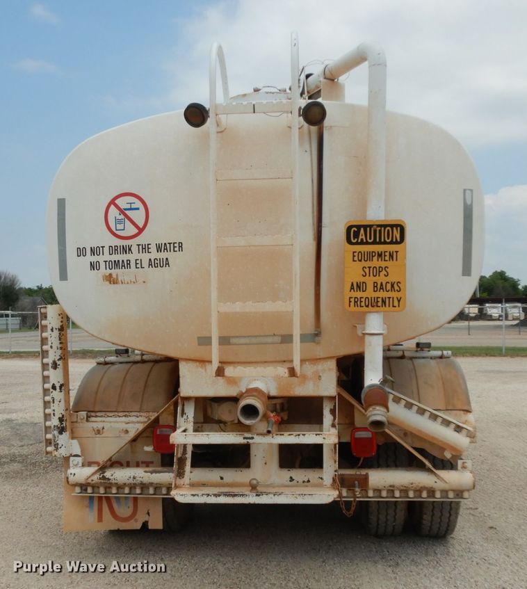 image for item DC2052 1990 White GMC WCS  water truck