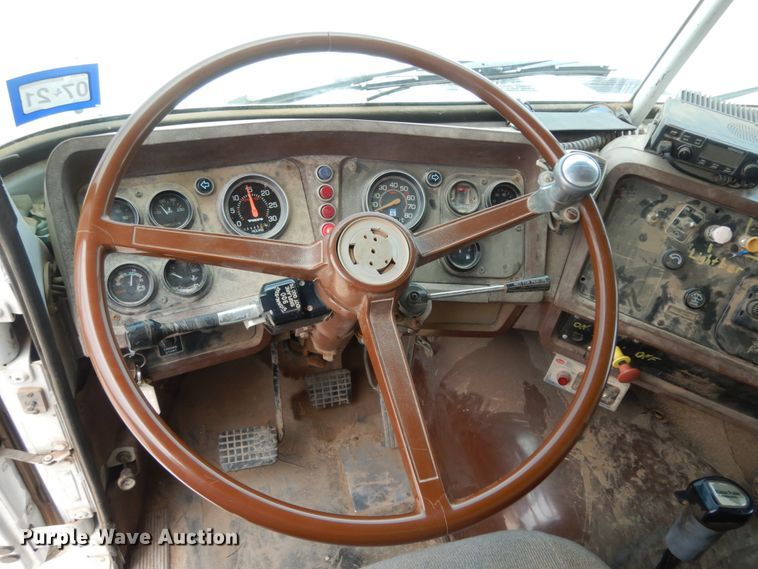 image for item DC2052 1990 White GMC WCS  water truck