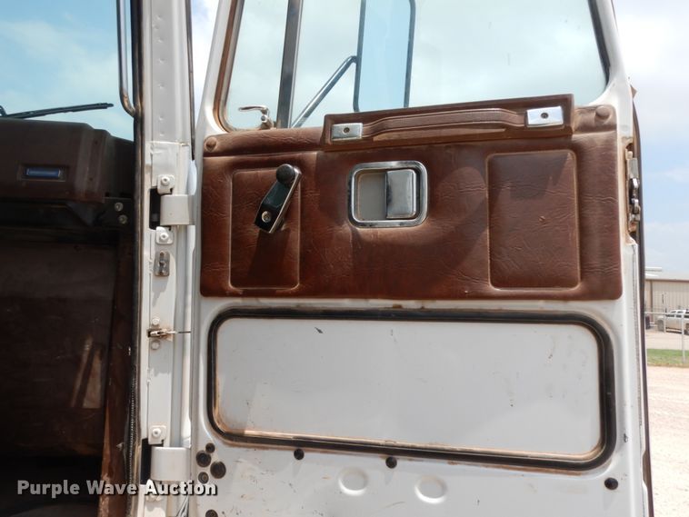 image for item DC2052 1990 White GMC WCS  water truck