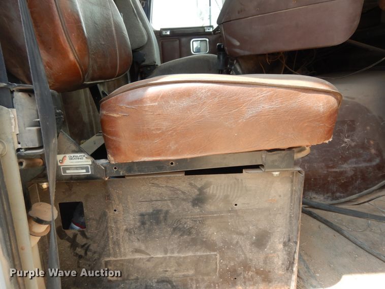 image for item DC2052 1990 White GMC WCS  water truck