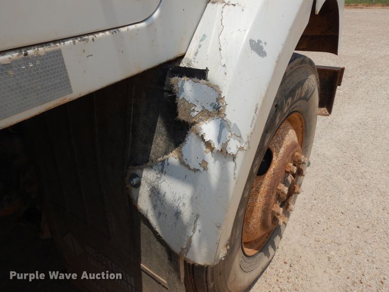 image for item DC2052 1990 White GMC WCS  water truck