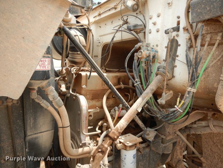 image for item DC2052 1990 White GMC WCS  water truck