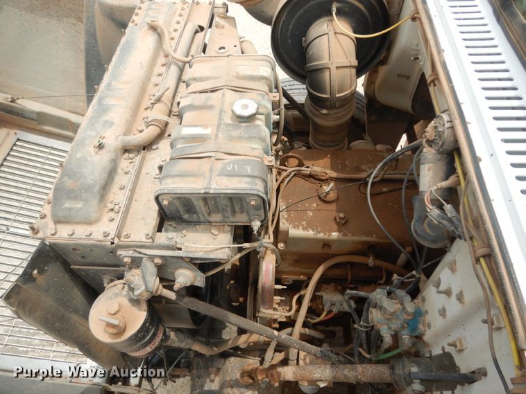 image for item DC2052 1990 White GMC WCS  water truck