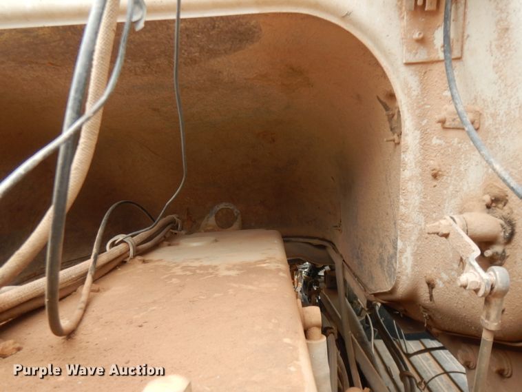 image for item DC2052 1990 White GMC WCS  water truck