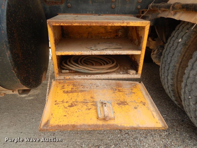 image for item DC2052 1990 White GMC WCS  water truck