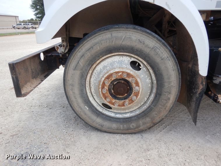 image for item DC2052 1990 White GMC WCS  water truck