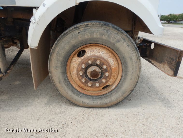 image for item DC2052 1990 White GMC WCS  water truck