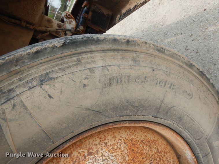 image for item DC2052 1990 White GMC WCS  water truck