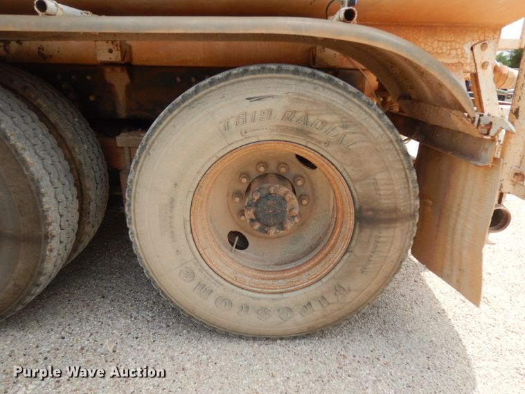 image for item DC2052 1990 White GMC WCS  water truck