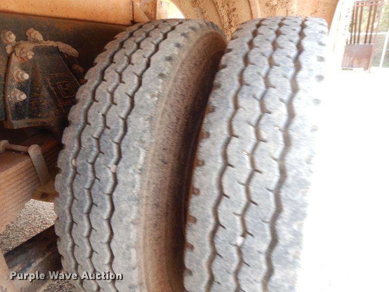 image for item DC2052 1990 White GMC WCS  water truck