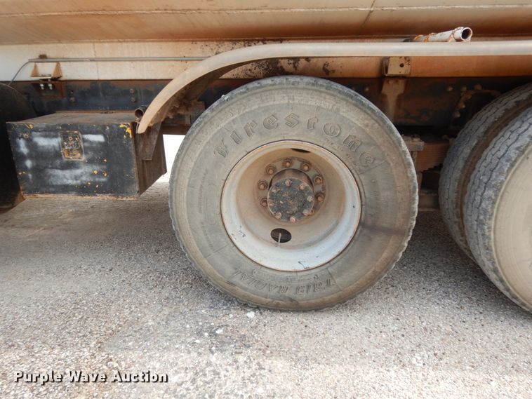 image for item DC2052 1990 White GMC WCS  water truck