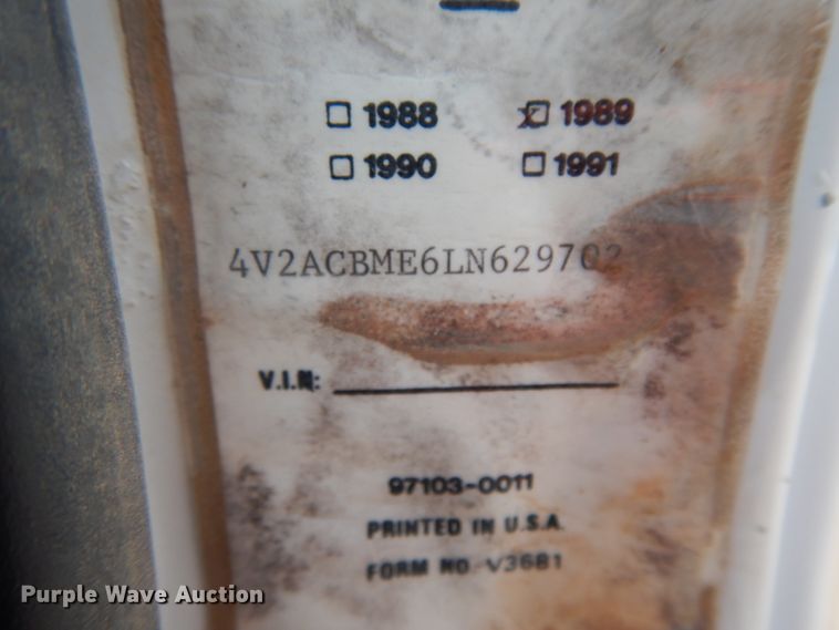 image for item DC2052 1990 White GMC WCS  water truck