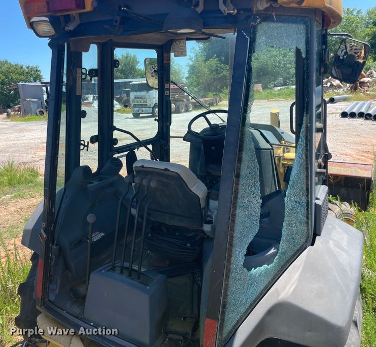 image for item IC9456 2003 John Deere 410G  backhoe