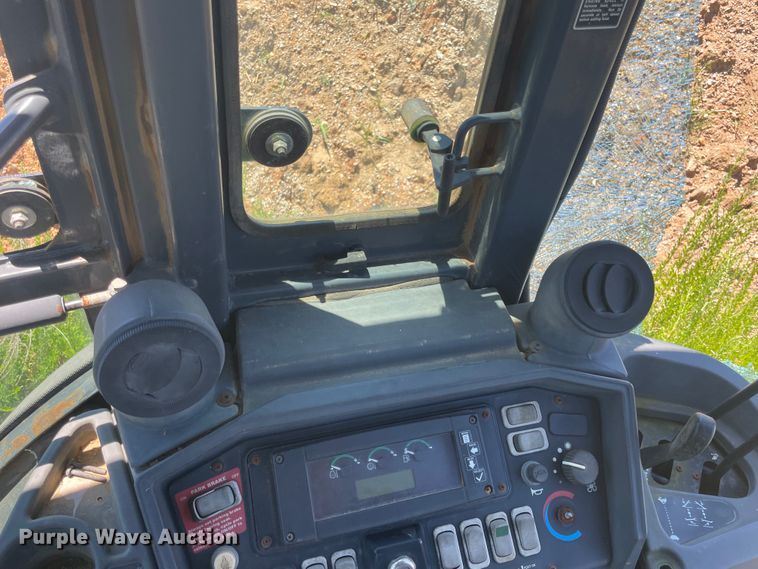 image for item IC9456 2003 John Deere 410G  backhoe