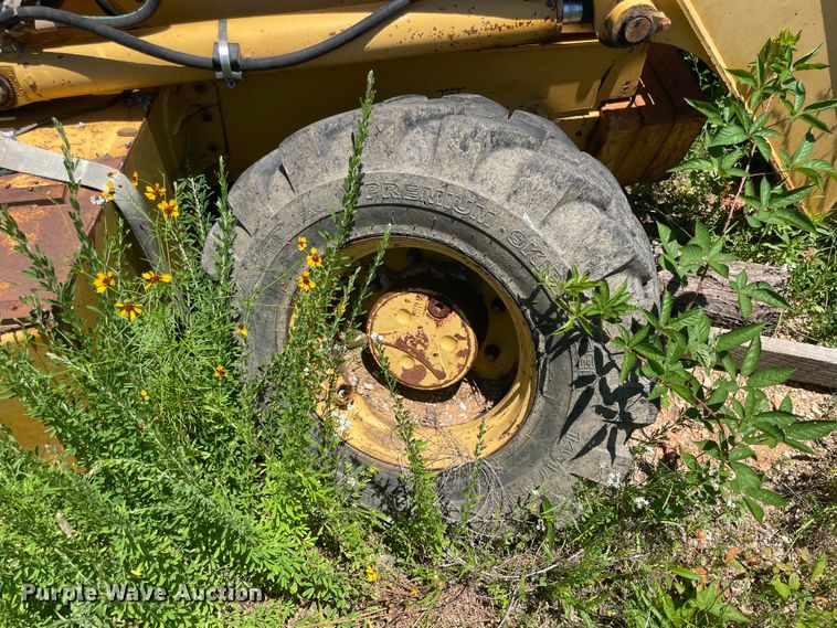 image for item IC9456 2003 John Deere 410G  backhoe