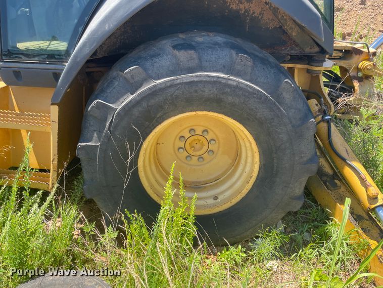 image for item IC9456 2003 John Deere 410G  backhoe