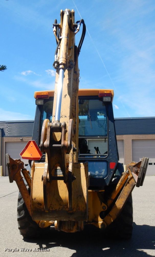 image for item IL9826 1999 John Deere 310E  backhoe