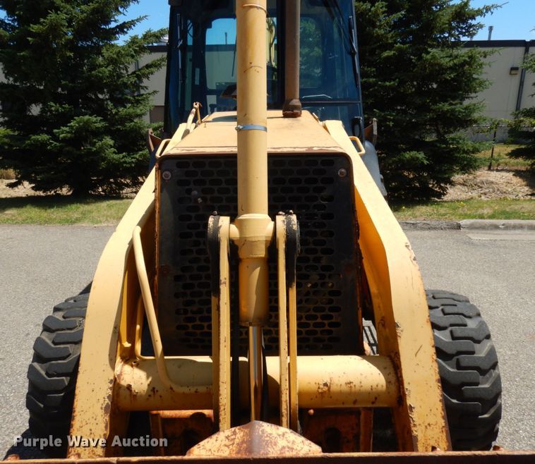 image for item IL9826 1999 John Deere 310E  backhoe