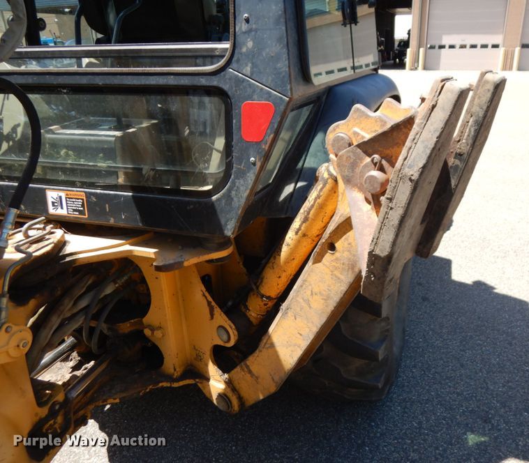 image for item IL9826 1999 John Deere 310E  backhoe