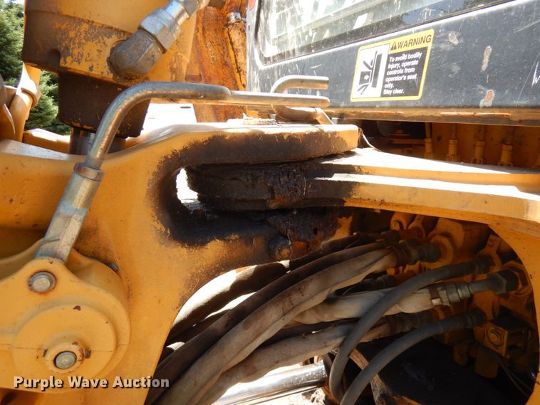 image for item IL9826 1999 John Deere 310E  backhoe