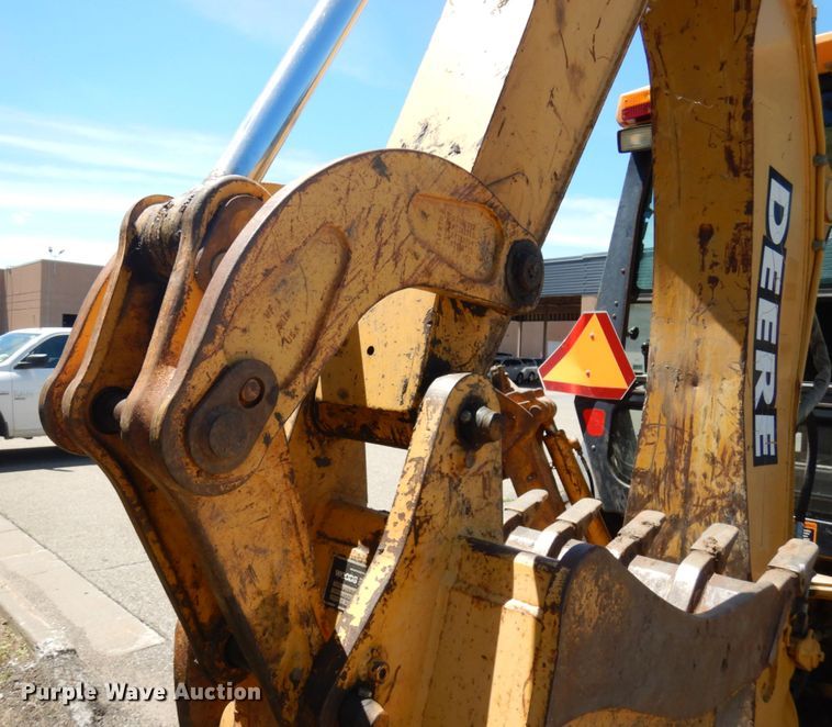 image for item IL9826 1999 John Deere 310E  backhoe